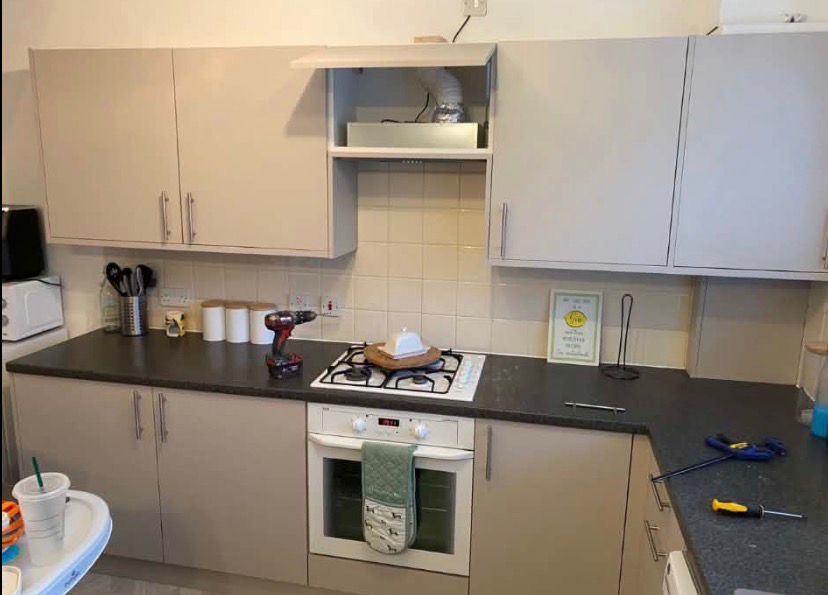 Cranbourne kitchen after the upgrade, with light-coloured cabinet doors